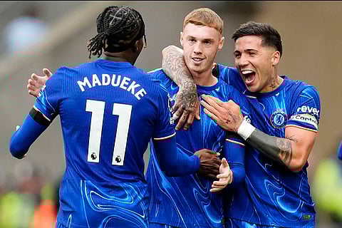 Premier League 2024-25: Chelsea's Cole Palmer, center, celebrates scoring with teammates Noni Madueke, left, and Enzo Fernandez